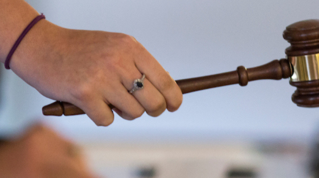A gavel being struck.