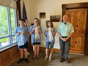 Okaloosa 4-H youth won third place in the team, intermediate division at the 2025 Florida 4-H Forest Ecology Contest. The team included Kaden Wise, Izzy Wise, and Kayleigh Thames presented by Red Baker, Director of UF's SNRE Department (left to right).