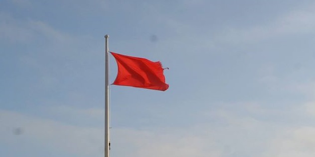 red beach flag