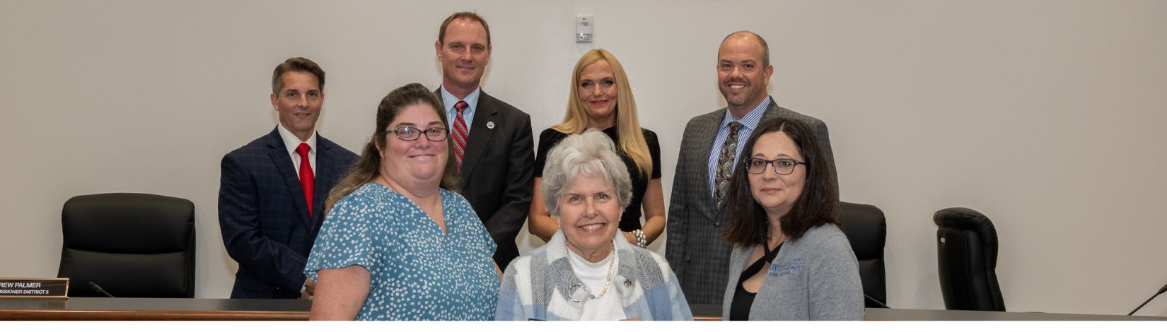Photo of Okaloosa County BCC Commissioners, Molly Peavy (Okaloosa County Farm Bureau) and Jennifer Bearden (UF/IFAS Okaloosa County Extension) receiving the Farm-to-City Proclamation.