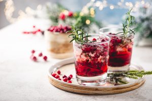 Refreshing drink with cranberries and rosemary 