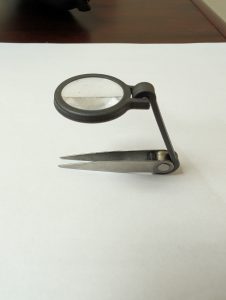 Tweezers can help remove debris from a wound