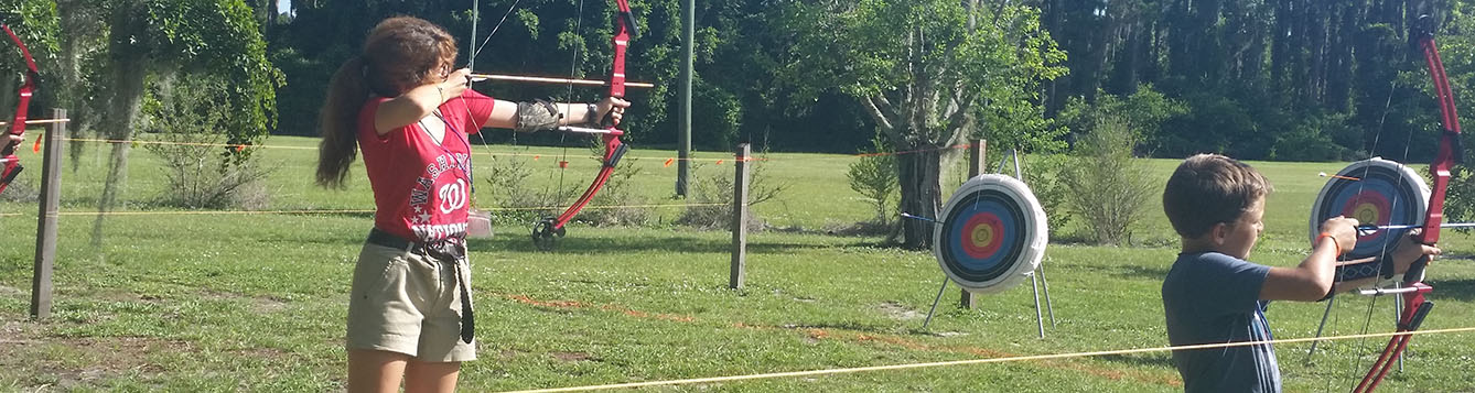 Boy and Girl doing archery