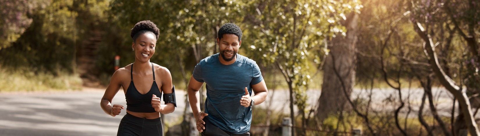 Health, exercise and black couple running, nature and workout goal with endurance, training and wellness. Runners, man and woman in the street, run and progress with health, performance and fitness.