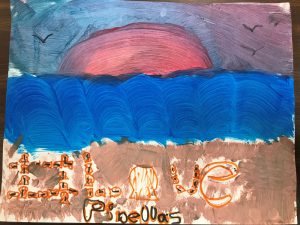 Child's painting of a sunset with #LovePinellas in the sand