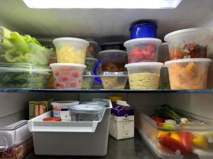 showing food items inside a fridge