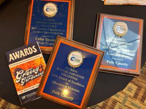 three plaques for the search for excellence awards