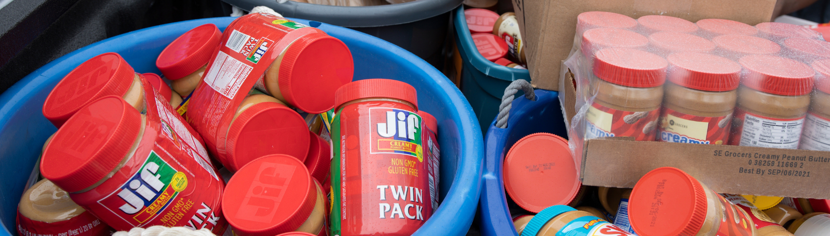 buckets filled with jaars of peanut butter