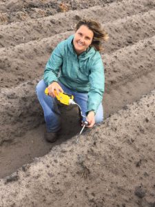 Agriculture Agents tests soil for fumigant concentration