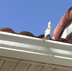 Rain sensor mounted on gutter