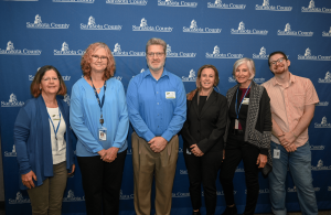 group of volunteers and staff members after receiving sarasota county honors for their efforts. [credit: sarasota county government]