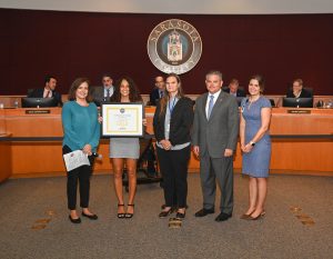 Sarasota County Government staff presenting LEED certificate at the September 27 board meeting.