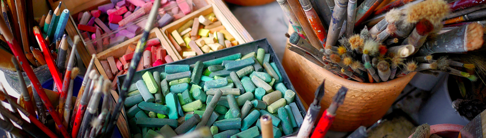 An artist's workbench. Photo Credit: Canva