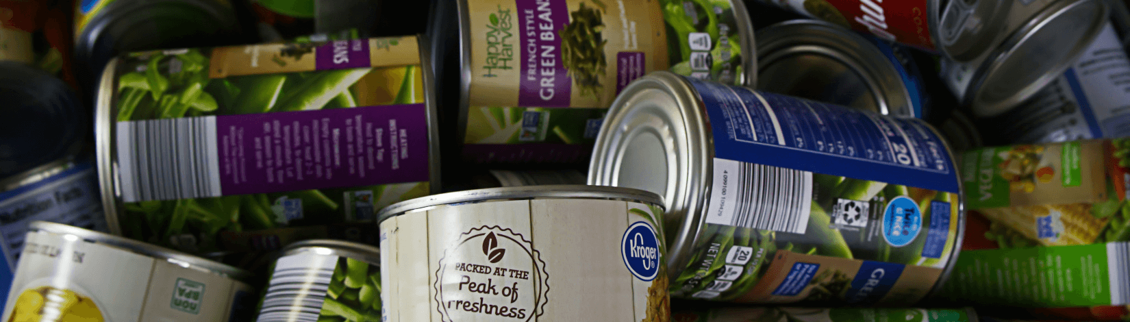 a mound of canned food products. [credit: unsplash, jacob mcgowin]