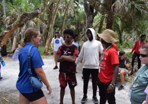 uf/ifas extension sarasota county intern kate albertus (left, blue shirt) talks with summer youth campers during an event at myakka river state park. [credit: uf/ifas extension sarasota county]