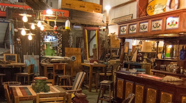 interior view at sarasota architectural salvage, showing an array of products and furnishings.