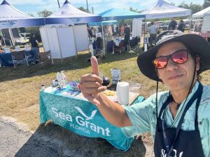 Florida Sea Grant Agent getting ready to grill shrimp tacos