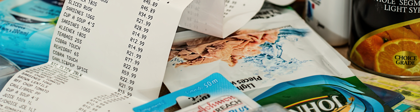 grocery store checkout receipt and groceries