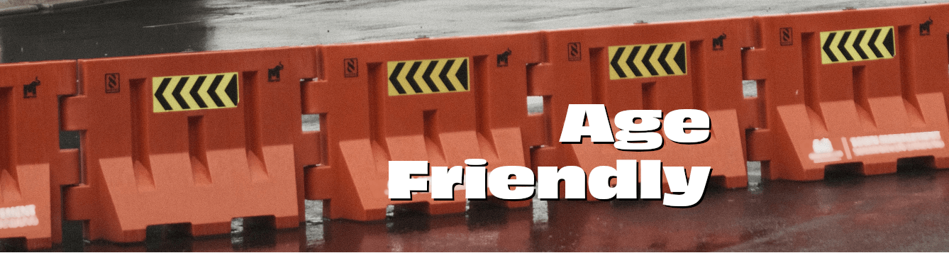 orange traffic barricades provide a roadblock. [credit: unsplash.com, dedy ferdian]