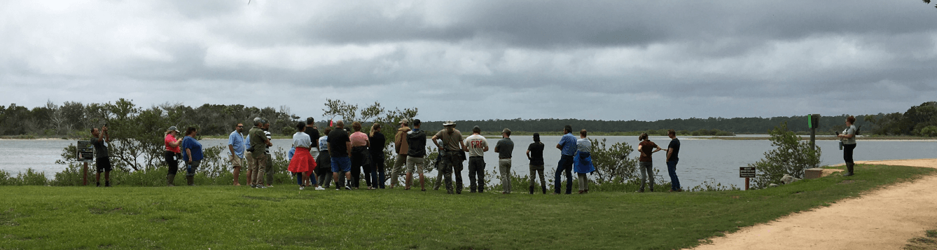 Living Shoreline course participants visit a local shoreline to assess and consider living shoreline characteristics. [CREDIT: UF/IFAS Extension, Mandy Sunshine Baily]