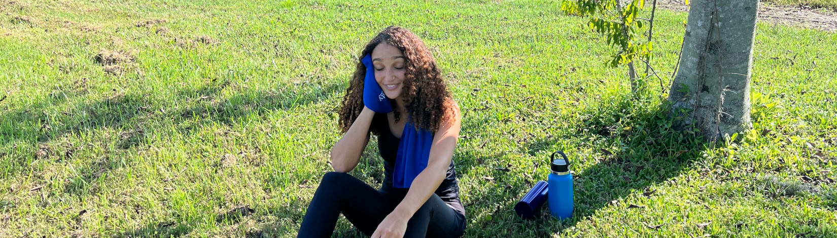 a young woman cools down after a workout in florida heat. [credit: uf/ifas extension sarasota county]