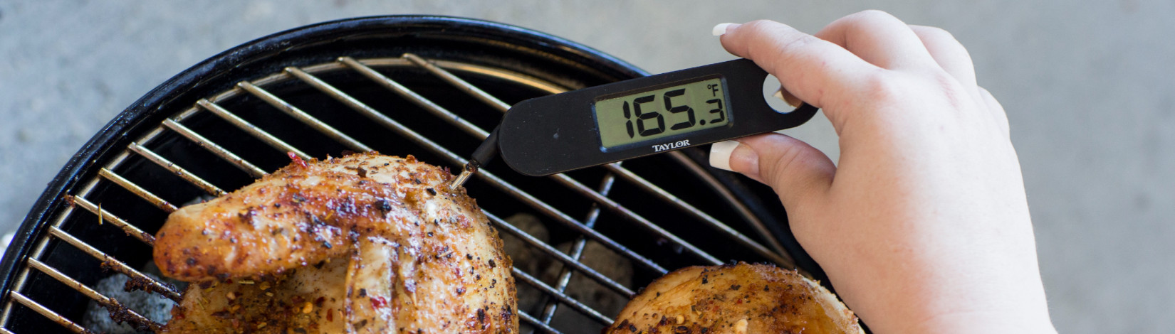 a digital meat thermometer reads 165.3 degrees fahrenheit while checking chicken on a barbecue grill. [credit: uf/ifas, tyle jones; edit: uf/ifas extension sarasota county]