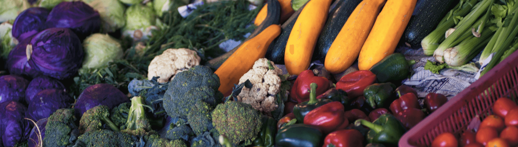 assorted fresh fruits and vegetables for sale in a farmers market display. [credit: unsplash.com, alexandr podvalny]