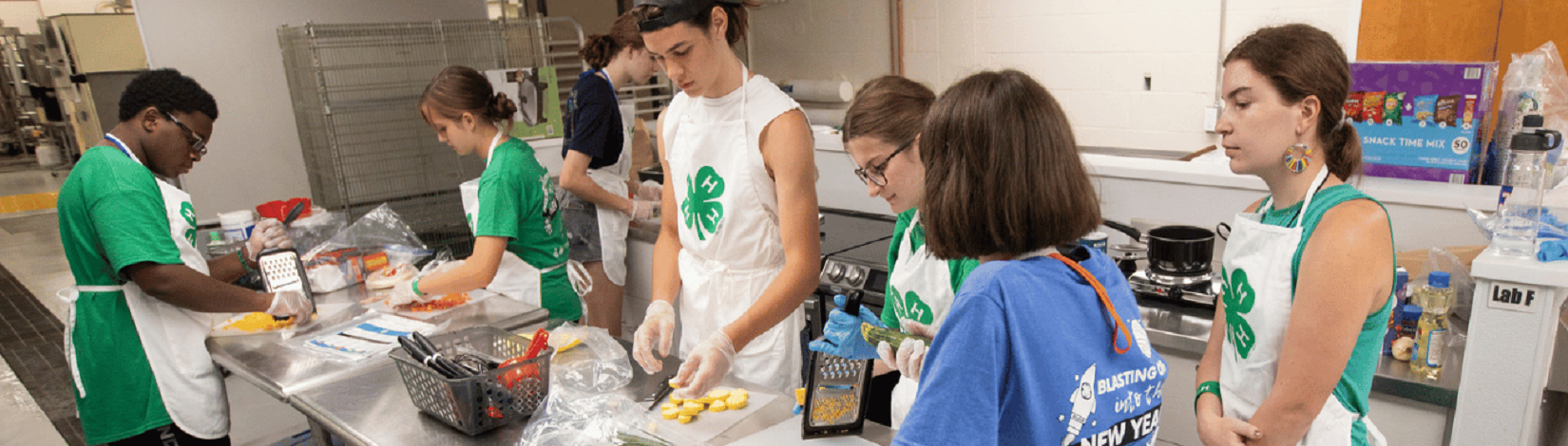 4-H youth cooking in a 4-H Food Challenge