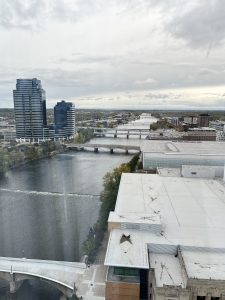 View from hotel showcasing the rapids and other buildings. 