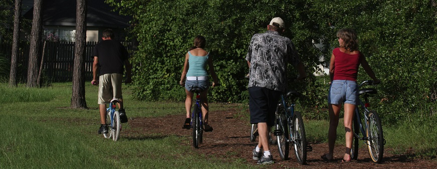 Family riding bikes together