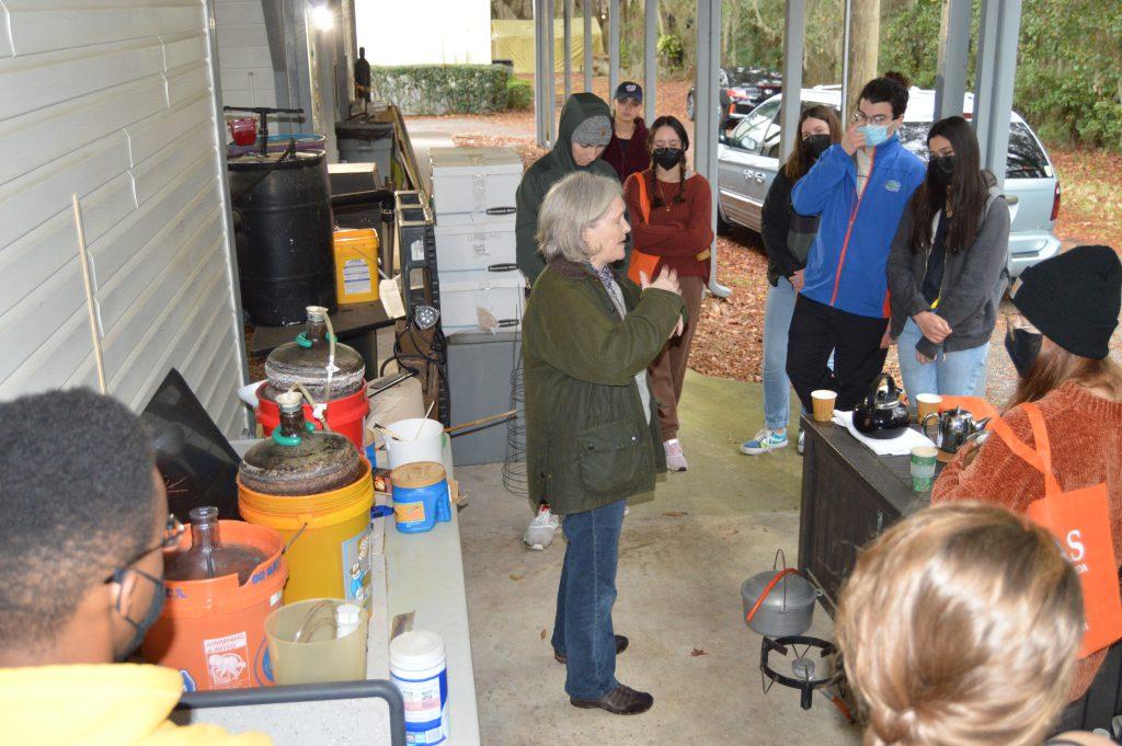 a professor explains the bio-digesting process to students.