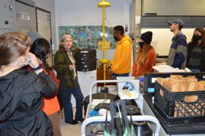 a professor discusses vermiculture with students