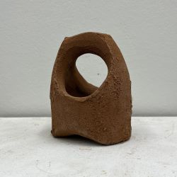 A finished work of art from naturally harvested clay.