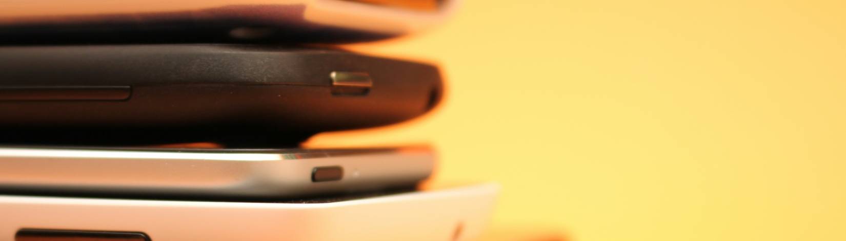 Stack of tablets and cellphones