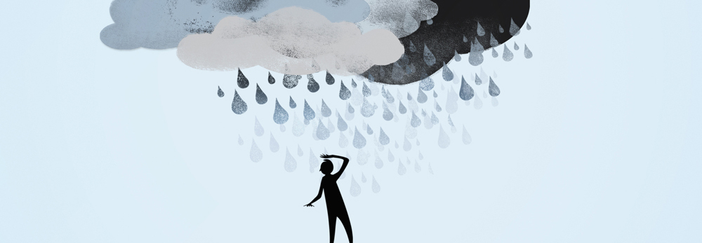 human figure covering its head from rain