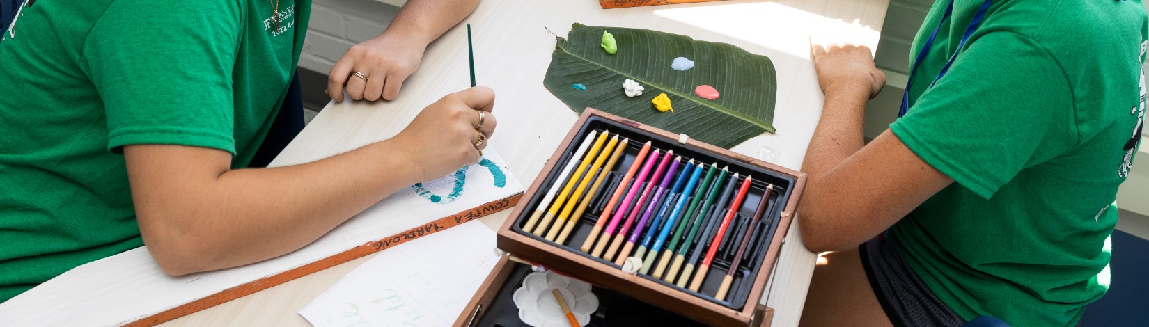 4H youth participating in a garden marker painting workshop at 4H University.