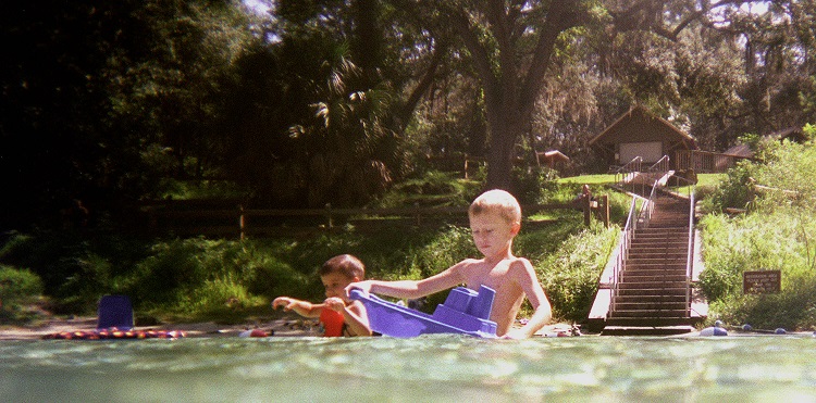 Kids playing in the water.