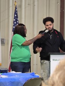 4-H alumni speaks at event.