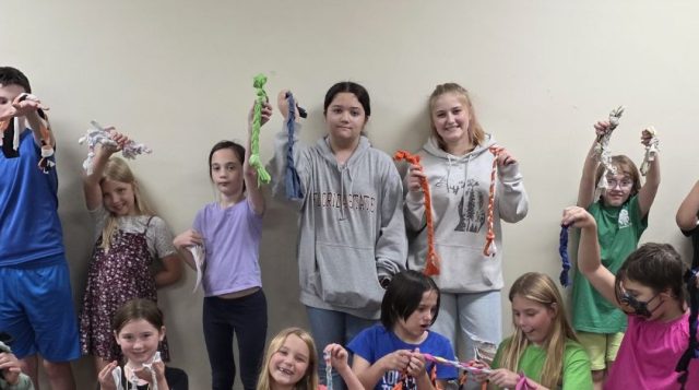 Children with dog toys.