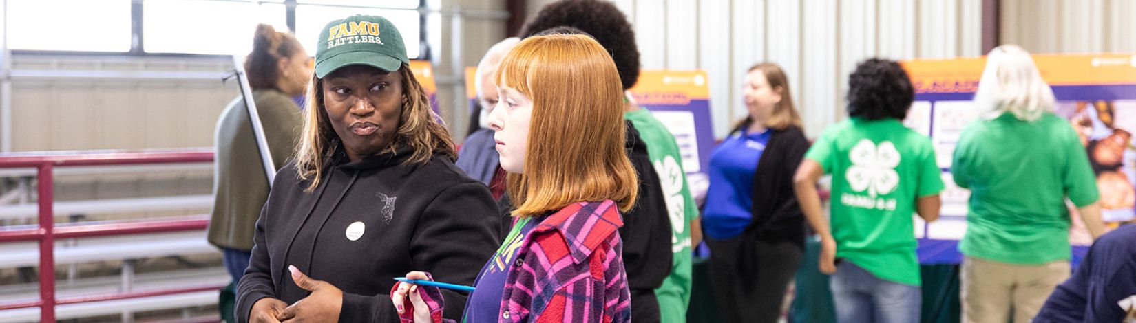 Youth and adults participate in a financial education workshop.