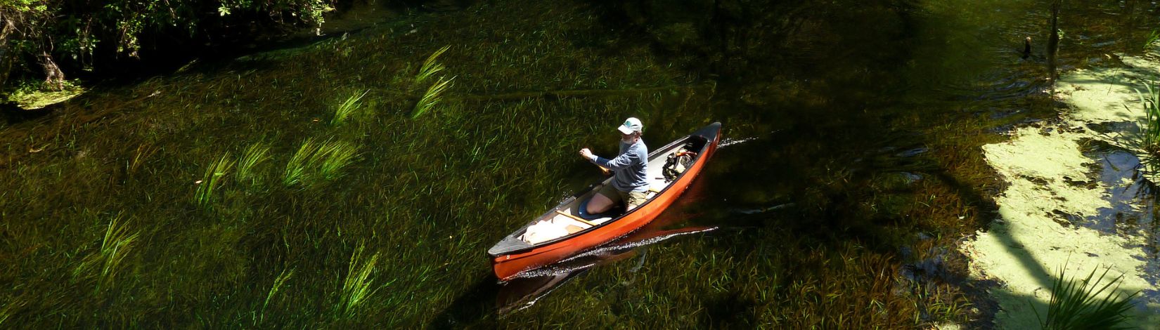 Canoes and paddlers at Ichetucknee Springs State Park.